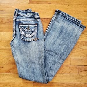 Flare jeans with studs.